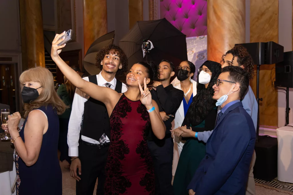 Photo of Gala attendees taking a selfie